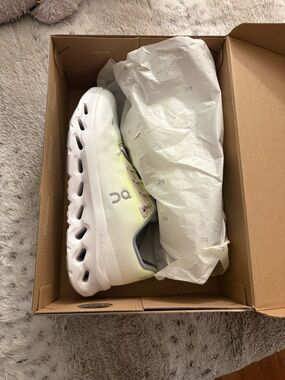 On cloud Women's Sneakers in White with Pale Yellow Accent